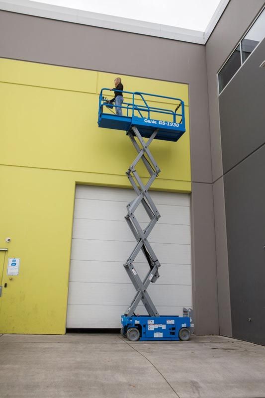 19ft scissor lift rental genie 1930