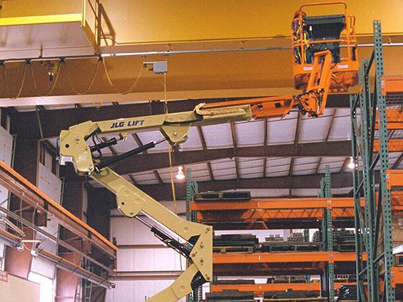 JLG E400 Series Boom lift in Warehouse rental equipment