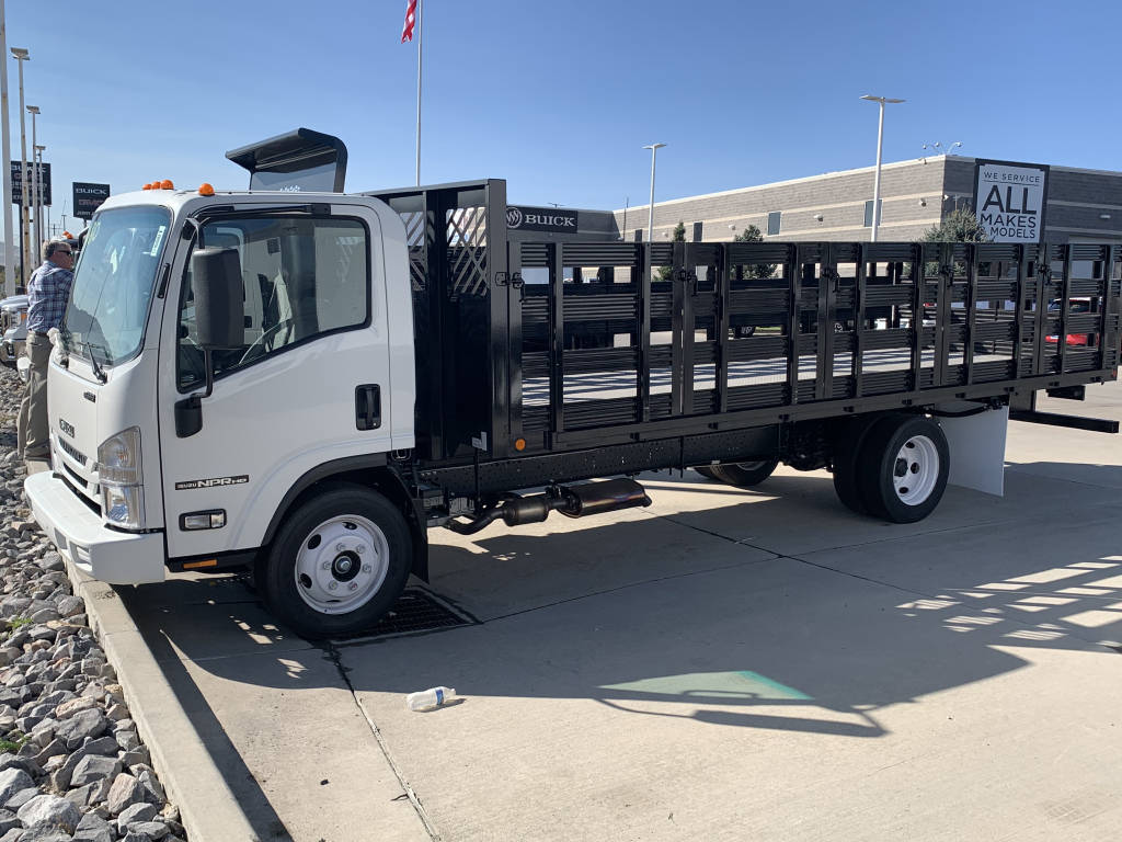 Isuzu NPR HD 20ft Flatbed Stakebed for Hauling