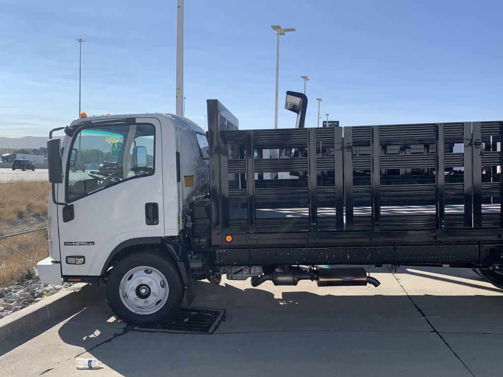 Isuzu NPR HD 20ft Flatbed Stakebed for Hauling